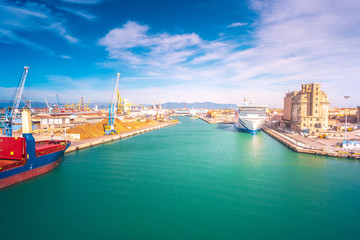 Fototapeta na wymiar Port of Livorno, one of the largest Italian seaports and one of the largest seaports in the Mediterranean Sea.