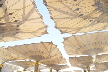 Big umbrella structure of al masjid al nabawi from the holy land and beautiful building structure madinah saudi arabia