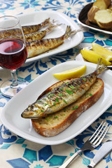 sardinhas assadas, portuguese grilled sardine on toasted bread