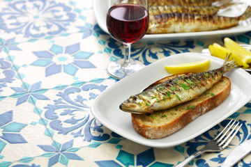 sardinhas assadas, portuguese grilled sardine on toasted bread
