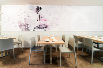 Hotel breakfast restaurant interior and background. Empty architecture white room. Bar with tables and chairs. Light Vintage style. Morning design. Cafe menu. Lunch, dinner snack. Modern lifestyle