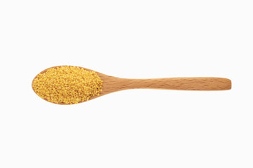 millet in spoon with white background
