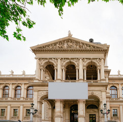Fototapeta na wymiar University of Vienna in Old city center in Vienna, Austria, Europe. Building Street archtecture and landmark of Public Educational institute. Cityscape with facade exterior. Ringstrasse.