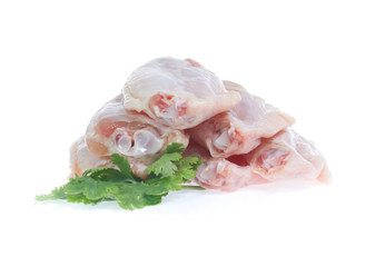 Raw chicken  on cutting board on white background