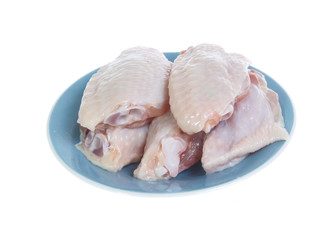 Raw chicken  on cutting board on white background