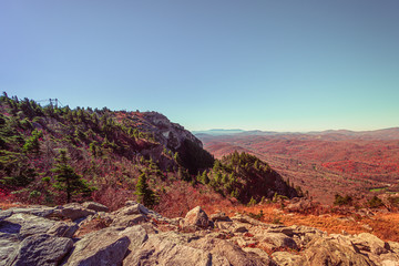 Grandfather Mountain State park in fall season. Grandfather Mountain is a mountain near Linville, North Carolina. At 5,946 feet, it is the highest peak on the eastern of the Blue Ridge Mountains.