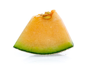 cantaloupe melon slices isolated on white background