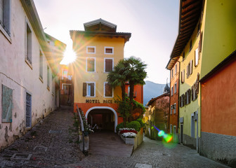 Cityscape with hotel building in Arco city center near Garda lake of Trentino of Italy. Street with house architecture at Old town in Trento near Riva del Garda. Travel and tourism. Sunrise in morning