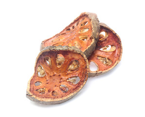Dry bael fruit on white background