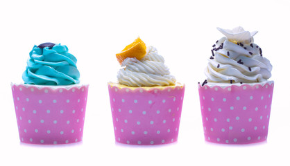 colorful cupcakes isolated on a white background
