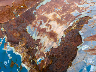 Heavily Rusted Metal with Cracking Blue Paint