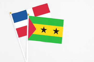 Sao Tome And Principe and Dominican Republic stick flags on white background. High quality fabric,...