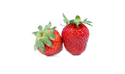 strawberries over white background