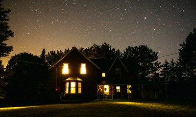 Solitude - old century farmhouse under the starry sky, Ontario, Canada