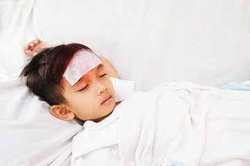 Asian boy is not comfortable.