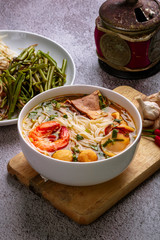 A colorful bowl of Bun Thai Tom Yum.