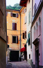 Fototapeta na wymiar Cityscape at Arco town center near Garda lake of Trentino of Italy. Street of Old city in Trento near Riva del Garda. Buidling architecture. Travel and tourism