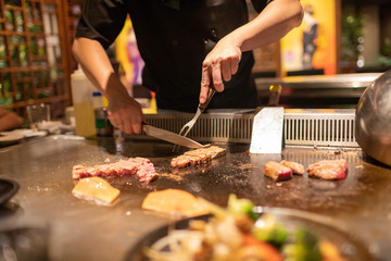 Teppanyaki Chef Cooking Japanese Steak