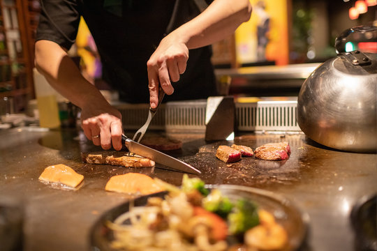 Teppanyaki Chef Cooking Japanese Steak