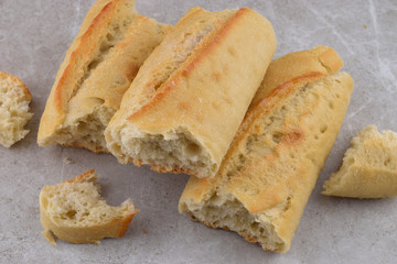 Fresh baked bread on gray stone background
