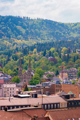 Fototapeta na wymiar Cityscape with Evangelist City Church at Black Forest in Old city of Baden Baden in Baden Wurttemberg region in Germany. View on Evangelische Stadtkirche Cathedral at Bath and spa German town.