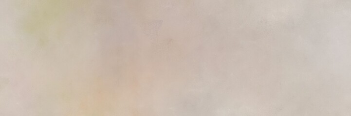 old color brushed vintage texture with silver, tan and pastel gray colors. distressed old textured background with space for text or image. can be used as header or banner