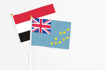 Tuvalu and Egypt stick flags on white background. High quality fabric, miniature national flag....