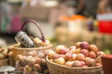 Blurred background view of hanging bags, for sale to customers, handicrafts, often seen in tourist spots, flea markets or shopping areas.