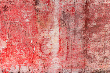 Texture of a concrete wall with cracks and scratches which can be used as a background