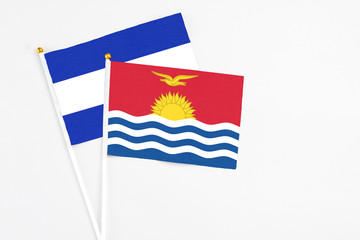 Kiribati and El Salvador stick flags on white background. High quality fabric, miniature national flag. Peaceful global concept.White floor for copy space.