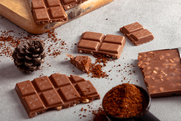 Chocolate bar on cement background