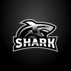 Shark esport badge logo emblem team simple professional design vector © aswin