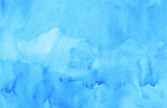 Watercolor light blue liquid background texture hand painted. Aquarelle sky blue abstract backdrop. Stains on paper. © Kseniya