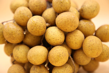longan fresh fruit of Thailand on yellow background