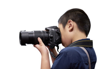 Asian boy holding digital camera