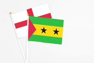 Sao Tome And Principe and England stick flags on white background. High quality fabric, miniature...