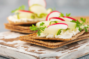 Healthy sandwiches with soft cheese and  vegetables