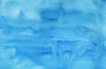 Watercolor light blue liquid background texture hand painted. Aquarelle sky blue abstract backdrop. Stains on paper.