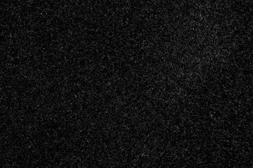Black canvas or velvet paper texture. Closeup