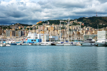 Fototapeta na wymiar Genoa, Italy, 10/04/2019: Beautiful port city on the banks of the marina with yachts.