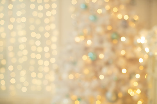 Defocused background with blurred Christmas light.