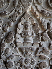 Closeup of a Carved Buddha in Bas Relief in Angkor Wat Cambodia