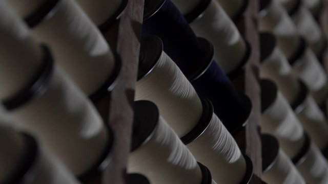 Closeup Of Cotton On A Warping Machine In A Textile Manufacturing Factory,
