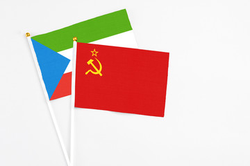 Soviet Union and Equatorial Guinea stick flags on white background. High quality fabric, miniature national flag. Peaceful global concept.White floor for copy space.