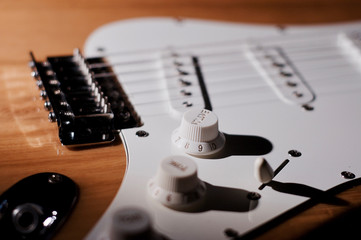 electric guitar closeup . dark background