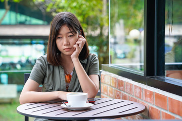 woman sitting in a cafe terrace