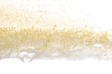 many bubbles in a layer of swee oil and water