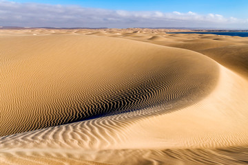 Desert sand dunes at the Lagoon of Khenifiss (Lac Naila).