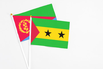 Sao Tome And Principe and Eritrea stick flags on white background. High quality fabric, miniature...