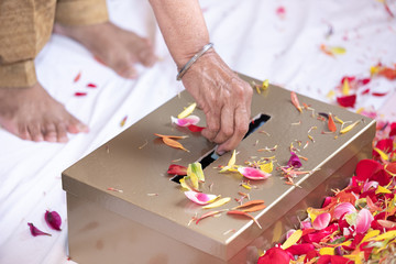Indian Sikh Ritual birthday ceremony flowers and donation box